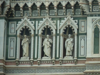 Sculptures in niches in the facade of duomo