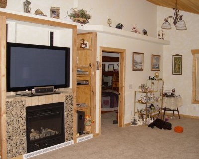 dsc00161 fireplace tv and bedroom entrance sample.jpg