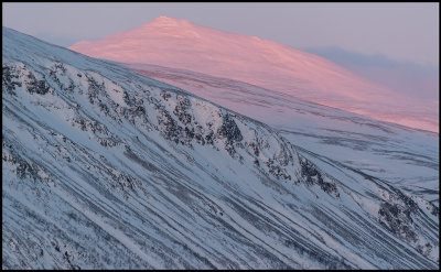 The first morning sunrays at Heargeloapmi (1411m) near Nikkaluokta  - Lapland