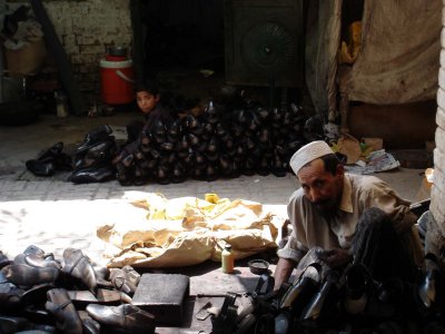 The master shoemaker. An Afghan kid invited me in for tea as I passed this shoe-making alley. This guy was the teacher