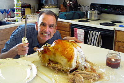 Thanksgiving--s-Doug with MeanTurkey.jpg