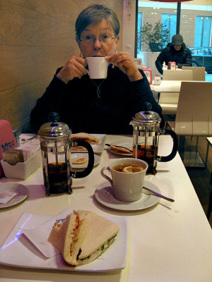 Margaret sippping tea between bites .. 4612
