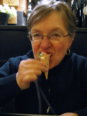 Margaret biting her tasty complimentary hors d'oeuvres .. 6086