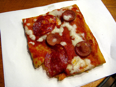 Spicy salami , sausage and tomato pizza .. 6418