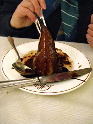 Poached pear drowned in chocolate .. 7049