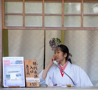 Ticket seller in traditional garb