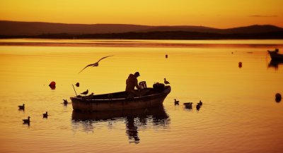 Fisherman at sunrise, Connemara