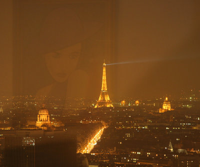 lady's romantic look over Paris by night