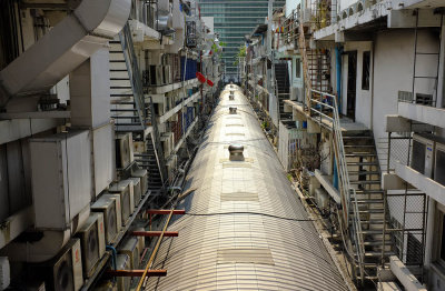 The shopping street is covered between the houses