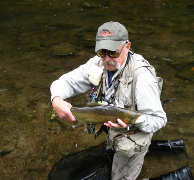 Gorgeous24 Rainbow with guide Bunky. Winning fish caught by Tom Marino!  1057.jpg