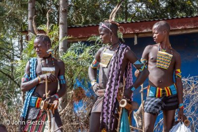 Bana Men Surveying the Market