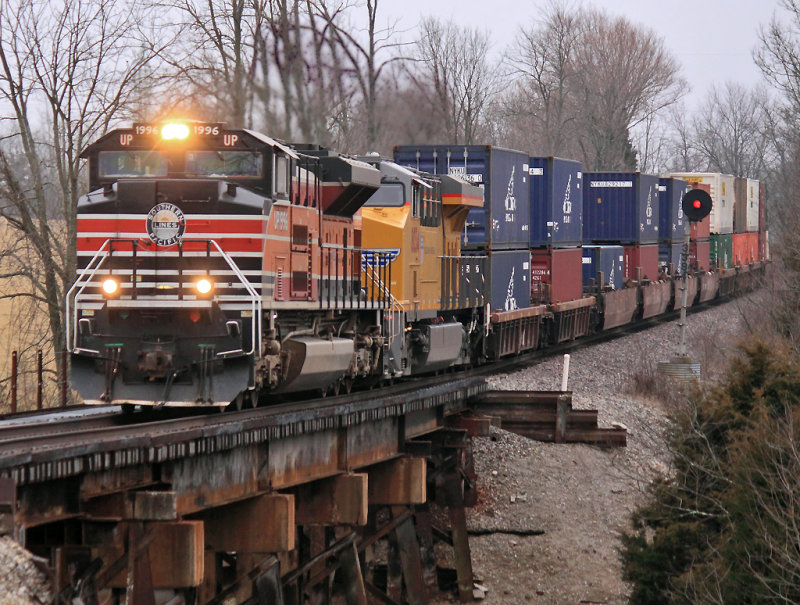 UP 1996, the Southern Pacific heritage unit, crosses the bridge at Bondville 