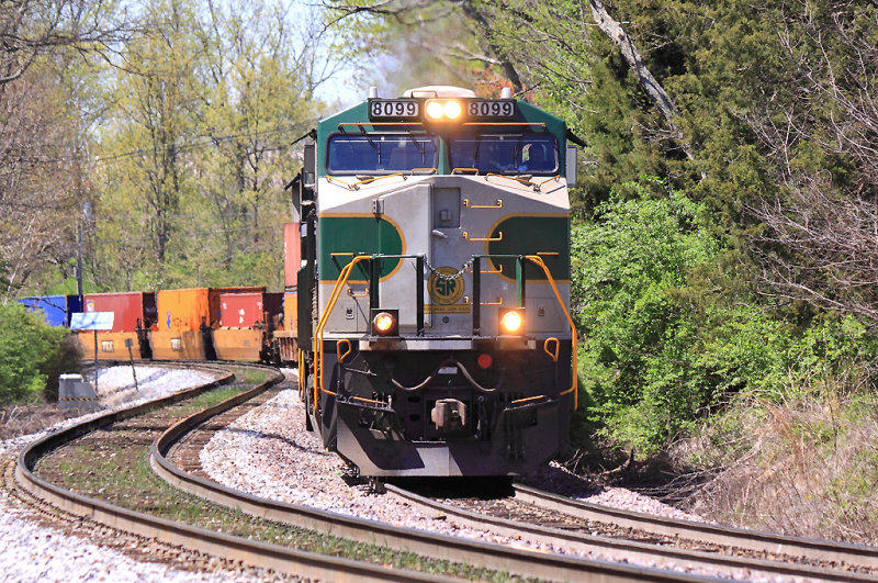 Southern 8099 leads NS 23G out of the siding at East Tucker 