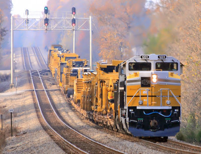 The shadows are getting long as NS 055 pulls South past the crossovers for a crew change 