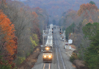 A Southbound grain train works through the long tanget at Sunbright 