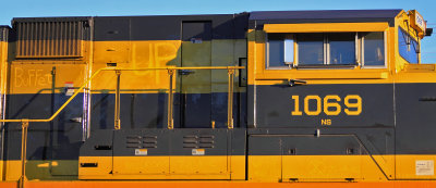 Dust Tagging on the side of NS 1069 after a trip on the BNSF 