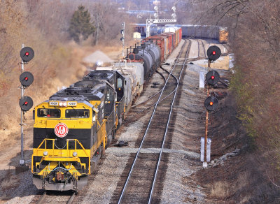 Virginian 1069 leads NS 117 past the searchlight signals  at South Danville 