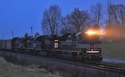 NYC 1066 leads Westbound 77J in the cold Kentucky rain 
