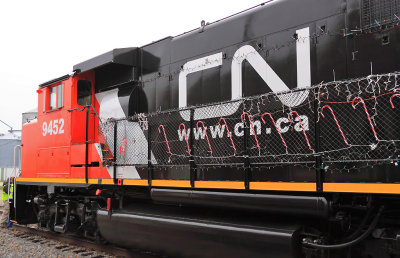 CN GP40-2LW #9452 decked out in new paint and decorations of the season 