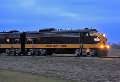 Classic EMD's speeding headlong into the gathering darkness on a cold Mid-Western night 