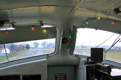 Christmas lights hung with care, in the cab of the 1750 at Cuba 