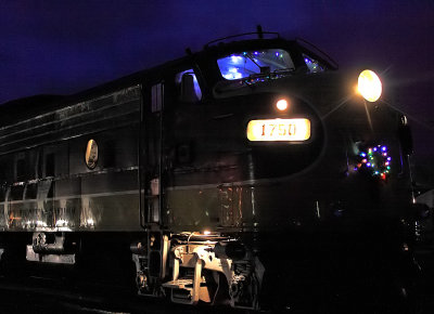 KJ 1750 sits at Smithfield with the Christmas light on as the last group of Children visit with Mr. Clause. 