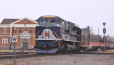 NS 1070 brings the train across the IC diamond at WABIC with the old Wabash depot in the background 
