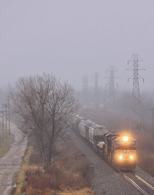 Westbound manifest in the fog at Righter IL 