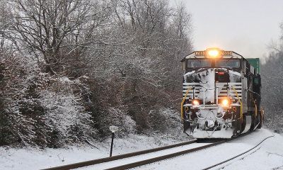 The lead engine of 285 shows the results of fighting the snow to the West as they roll across the Louisville District 