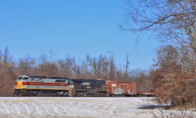 NS 117 rolls South through the snow at Junction City 