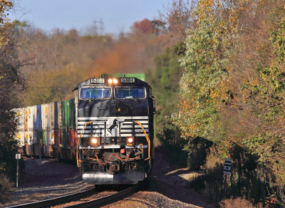 Train 295 comes across single track between Woods and Grove, on the South side of Somerset. 