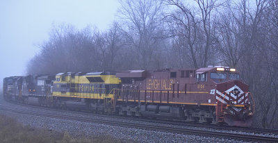 Just after sunrise, NS 111 holds the main at Waddy to meet a Westbound 