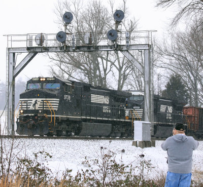 NS 177 rolls down Norwood hill in a light snow as Mr. Hoyden gets his shot of the train and those classic Southern signals