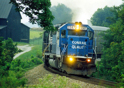 A former CR SD40-2 leads NS 375 at Kirkwood curve, on a muggy summer day in 2003