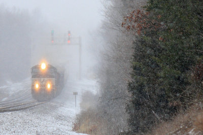 NS 177 rolls through the dip at Gradison in a light snowfall 