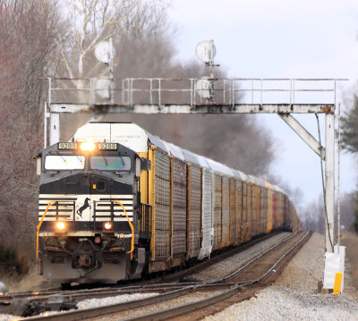 A lone GE struggles to keep a mile of empty racks moving as they pass through the interlocker at Waynesburg 