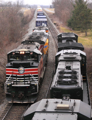 NS 111 eases down the siding at Waddy as 224 passes them on the main with Espee 1996 leading 