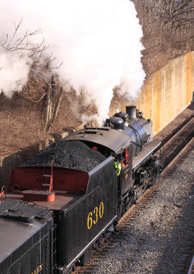 The sharp report of her square exhaust echos off the hillsides as 630 gets away from Bristol, Eastbound on the N&W