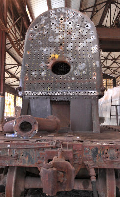 The boiler of #14 sits on a ancient K&T flatcar while under restoration 