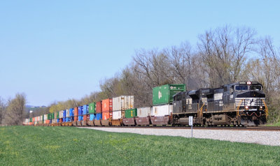 Train 295 sprints down the valley near McKinney with 10,000 feet of stacks in tow 