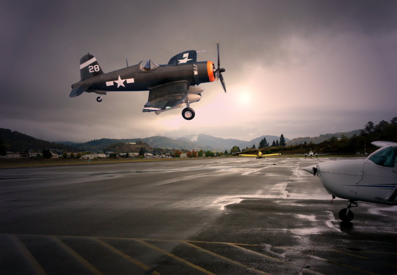 Corsair.buzzing the airfield.P.shop.jpg