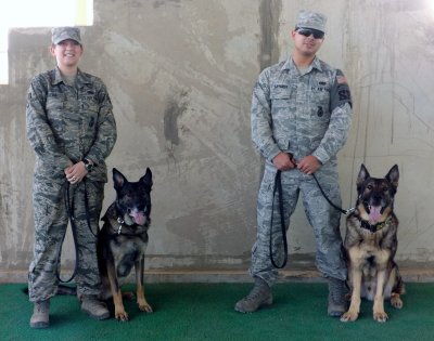 SSgt Aalexandra Jecha & Dexter with SSgt Daniel G Sayarot & his MWD