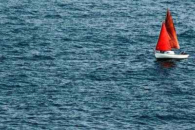 White boat, red sails, Cornwall