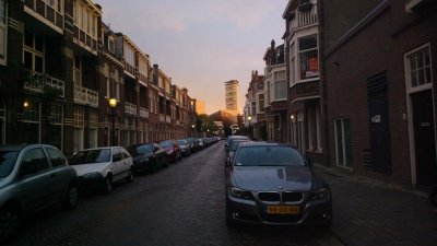 Bentinckstraat with late sunlight in the distance
