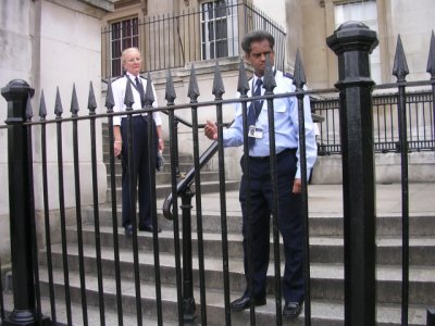 Guards shutting the gates to the National Gallery