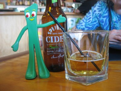 Gumby enjoys a beverage while waiting his turn at the ipad