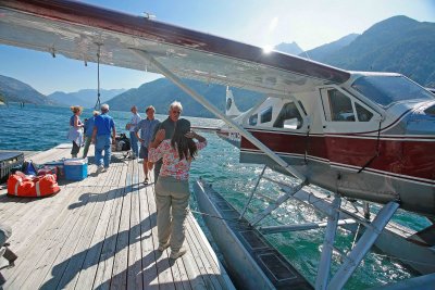 Brick Wellman Unloading Passengers at Stehekin Dock