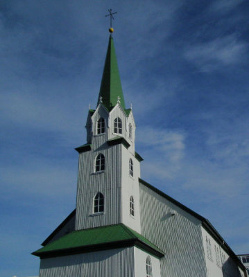 Church tower by City Pond Reykjavik poss Stoffnun Frikirkja