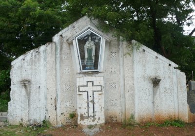 Roadside chapel damaged by war