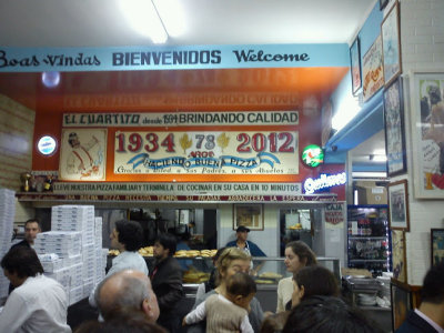 The inside of El Cuarito, home of wonderful pizzas and empenadas -  mmm good!